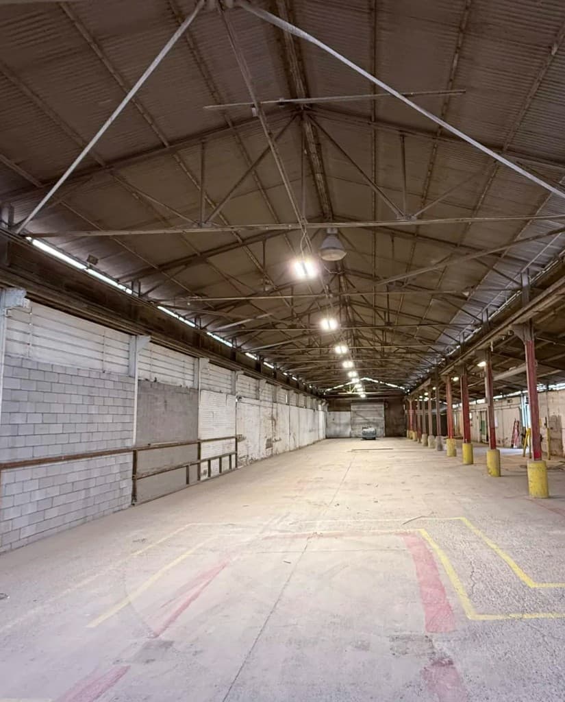 Commercial warehouse with high-bay lighting and industrial electrical infrastructure